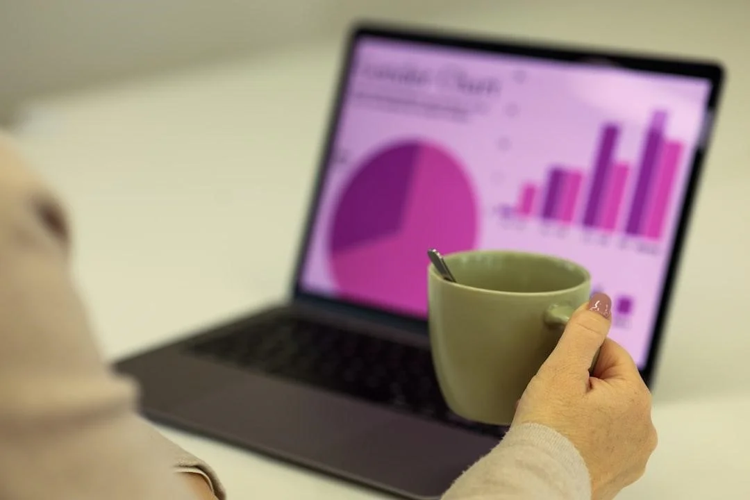 A dashboard with analytics displayed on a laptop screen