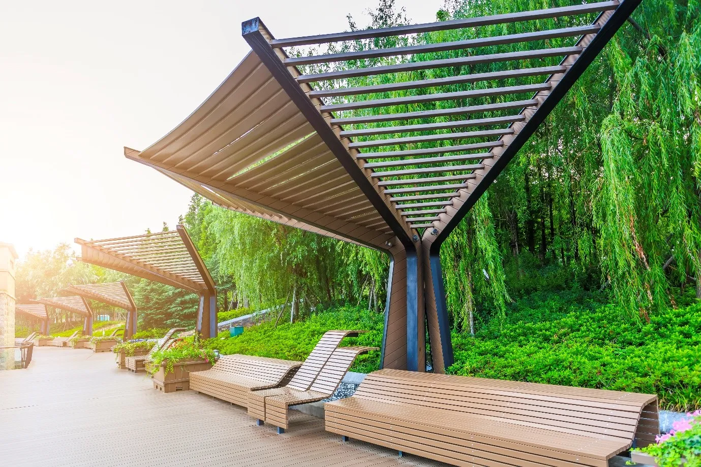 Role of Outdoor Living Structures in Hospitality Spaces By Weather